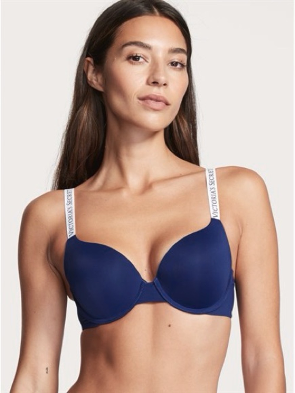Victoria's Secret dark blue underwire bra featuring the brand's signature white